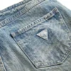 Denim-Hose mit Ösen und niedriger Leibhöhe