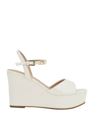 Zione Keilabsatzschuhe aus Lackleder